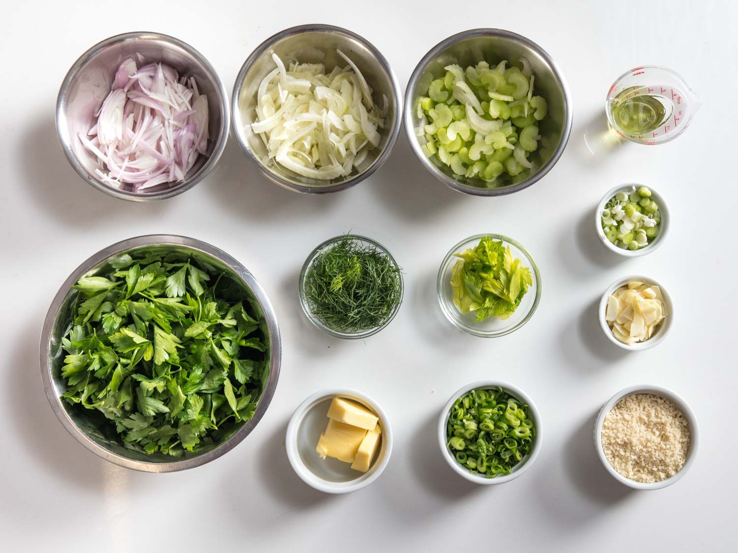 Overhead shot of ingredients for oysters Rockefeller.